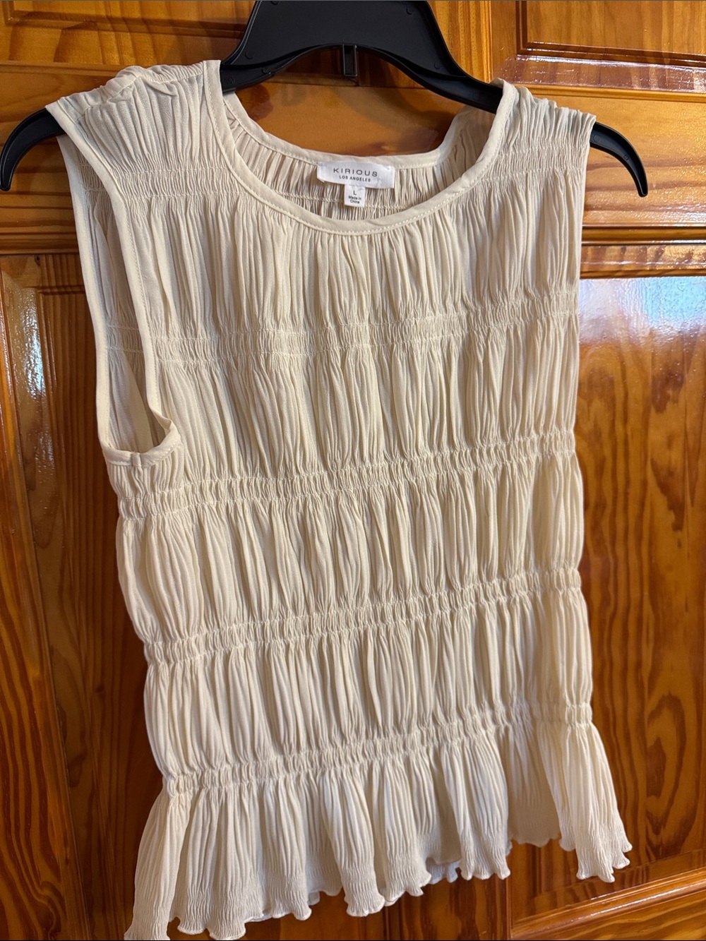 Kirious Cream Smocked Sleeveless Peplum Top